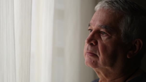 Pensive Older Man Standing Window Looking Out — Vídeos de Stock