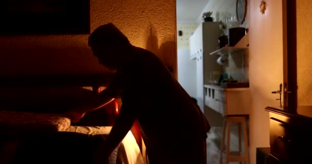 Senior Man Laying Bed Turning Night Lamp — Stock Video