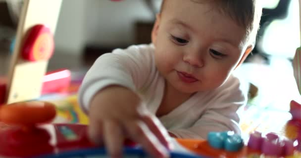 Cute Baby Playing Toy Indoors Close Adorable Child Plays Touching — Stockvideo