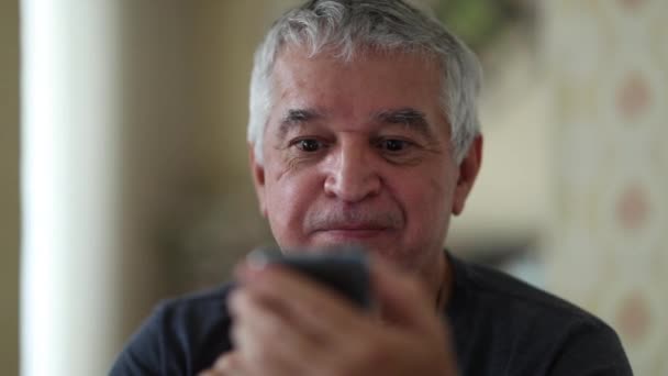 Older Man Looking Cellphone Screen Reacting Positively Good News — Stock video