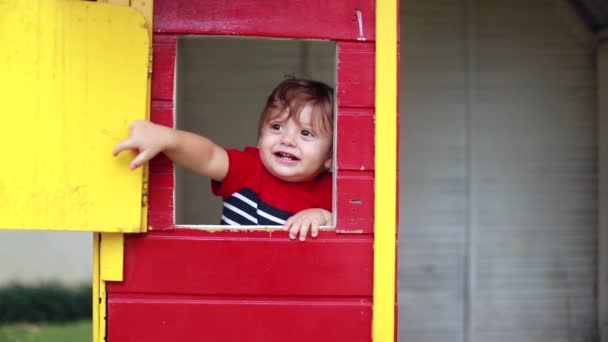 Cute Baby Playing House Playground Infant Face Appearing Toy House — Video Stock