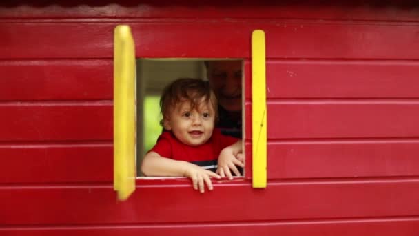 Cute Baby Toddler Appearing Toy House Window Grandpa — Wideo stockowe