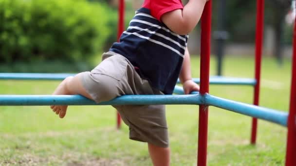 Baby Child Playground Playing Climbing Monkey Metal Bar — Stockvideo