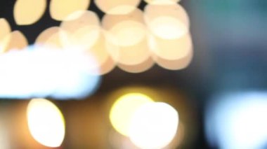 Bright colorful driving at night blurred with bokeh