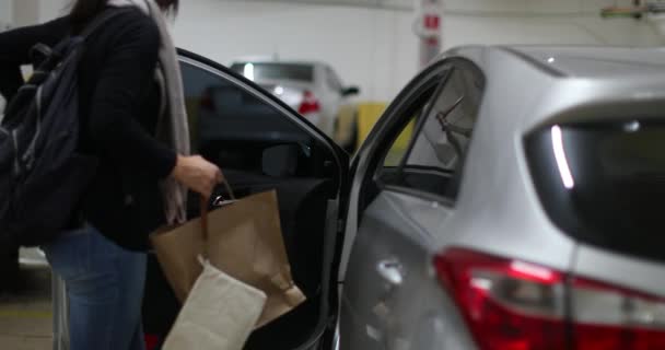 Woman Opening Car Door Entering Vehicle Garage Parking Lot Woman — Stock video