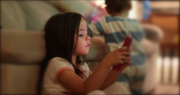 Little Girl Using Smartphone Night Child Staring Cellphone Screen Evening — Vídeo de Stock