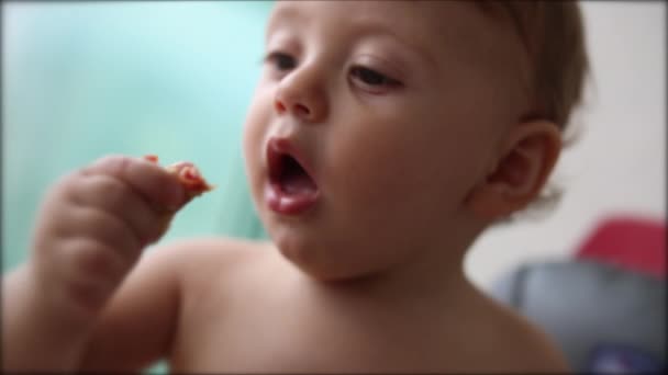 Cute Baby Infant Toddler Face Eating Food — Vídeo de stock