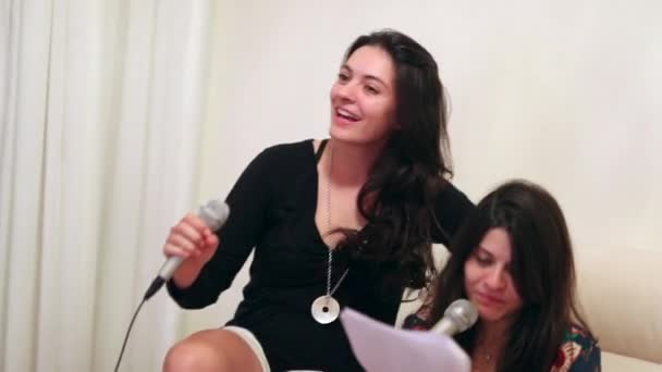 Women Singing Karaoke Home — Vídeo de stock