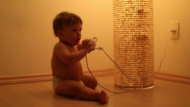 Cute Toddler Playing Standing Lamp Baby Living Room Floor Next — Stock Video