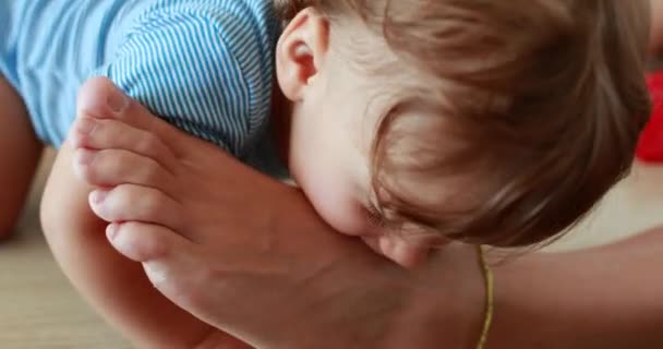 Baby Biting Mother Feet One Year Old Infant Child Taking — Stockvideo