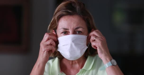 Older Woman Removing Surgical Mask Protect Epidemic Outbreak Senior Woman — Stockvideo