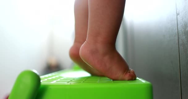 Baby Tiptoes Reaching Object Close Infant Feet Toes Tiptoe — Stockvideo