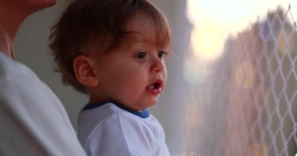 Parent Holding One Year Old Infant Baby Apartment Balcony Safety — Stockvideo