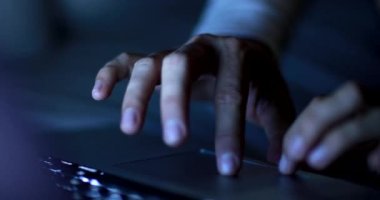 Hand close-up using laptop computer