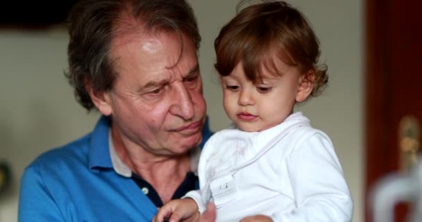 Grandfather Holding Grandson Baby Lap Feeding Lunch — Video Stock