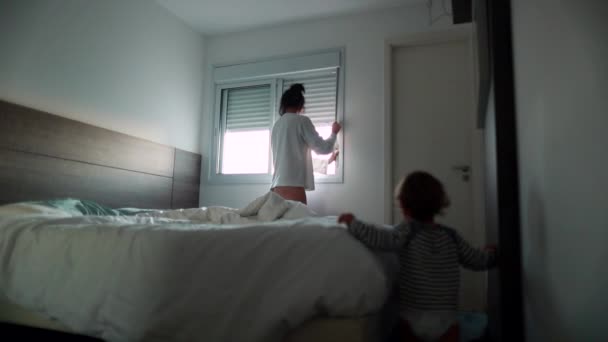 Mother Child Waking Morning Woman Opening Window Blind Looking — Vídeo de stock