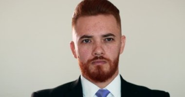 Business man portrait looking to camera smile nodding yes thinking