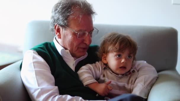 Grandfather Grandson Watching Together — Stockvideo