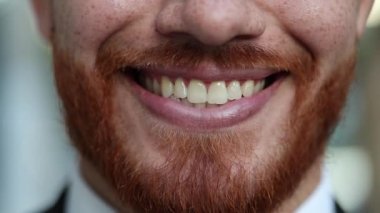 Close-up of man lips changing mood, person changing emotion becoming serious