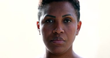 African woman portrait face close-up staring at camera