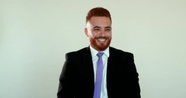 Happy business man smiling. Spontaneous authentic laughing