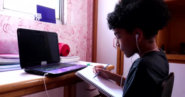 Mixed Race Boy Writing Notes Notepad Home Doing Homework — Vídeos de Stock