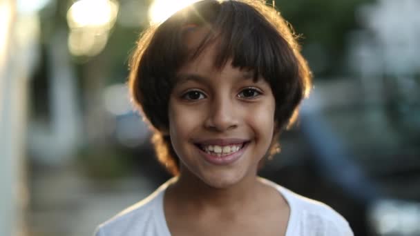 Portrait Mixed Race Child Boy Becoming Serious Staring Camera Kid — Stockvideo