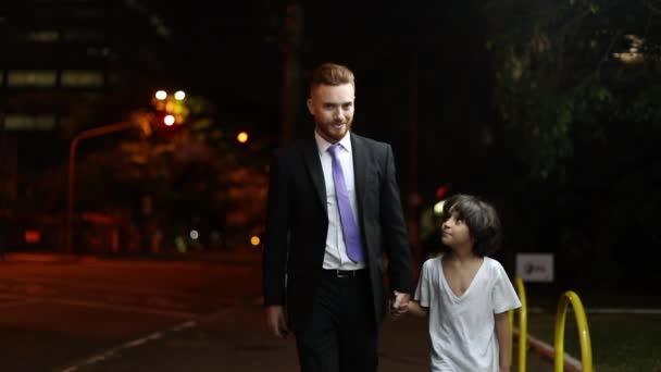 Interracial Father Son Child Walking Night Holding Hands Work — Stock Video