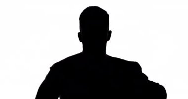 Gizemli, zarif yönetici iş adamının silueti takım elbise giyiyor.