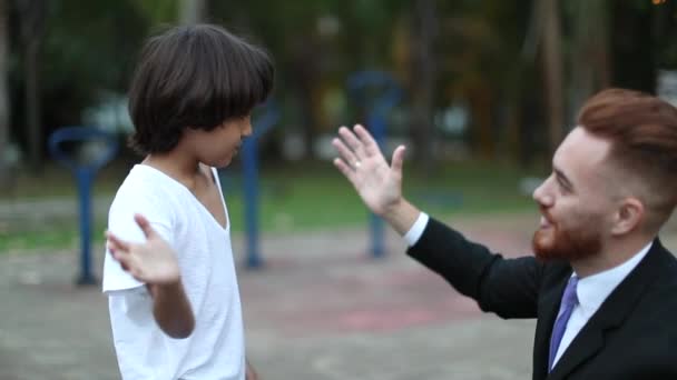 Father Child Doing Fistbump Handshake Racially Diverse Parent Son — стоковое видео