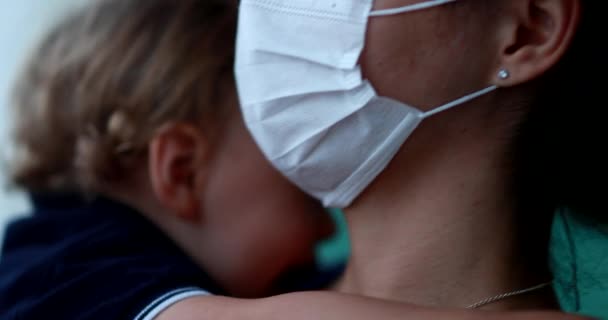 Baby Hugging Mother Pandemic Parent Wearing Surgical Mask Covid Epidemic — Stockvideo