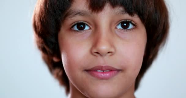 Pensive Mixed Race Boy Closeup Face Child Thinking — Stockvideo