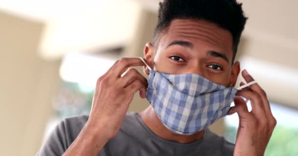 Young Man Putting Covid Face Mask Black African Ethnicity Wears – Stock-video