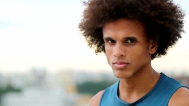 Dramatic serious african man looking to camera