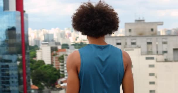 Young Black African Man Overlooking City View Top Rooftop Turning — Video Stock