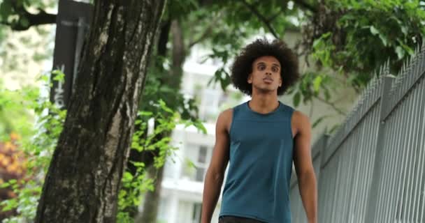 Young African American Man Walking City Sidewalk Casual — Vídeo de Stock
