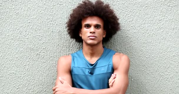 Serious Young African Mixed Race Man Leaning Wall Staring Camera — Wideo stockowe