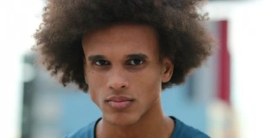 Cool Mixed race man looking to camera