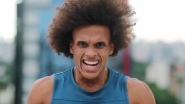 Angry African American man yelling