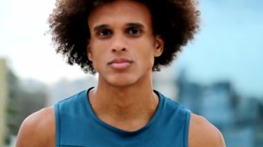 Handsome black man looking to camera