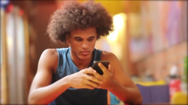 Young Handsome Black Holding Cellphone African Man Checking Smartphone Smiling — Stockvideo