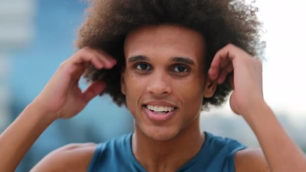 Handsome Black Man Adjusting Afro Hair — Vídeo de Stock