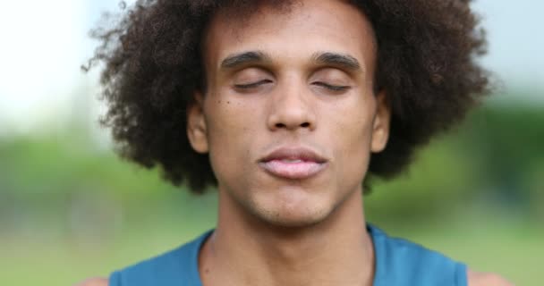 Young Handsome Mixed Ethnicity Man Closing Eyes Taking Deep Breath — Vídeo de Stock