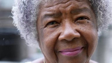 Portrait of a senior black woman closeup face looking at camera