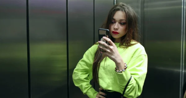 Pretty Girl Adjusting Hair Taking Photo Front Mirror Elevator Attractive — Stock Photo, Image