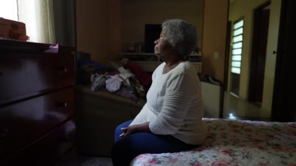One Senior Bllack Woman Sitting Bedside Bedroom — Videoclip de stoc