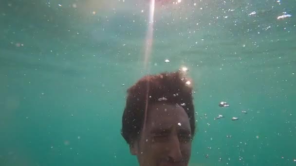 Man Swimming Water Emerging Lake Surface — Stok video