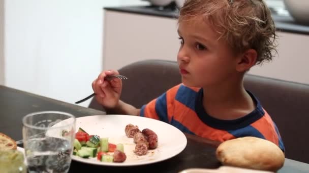 Toddler Boy Eating Dinner Child Eats Supper — Stockvideo
