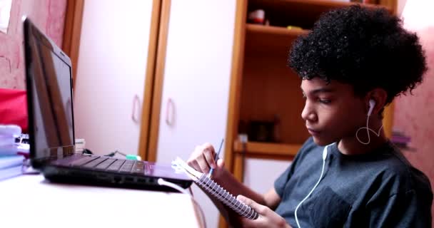 Child Doing Homework Home Front Laptop Black Ethnicity Kid Writing — Stockvideo