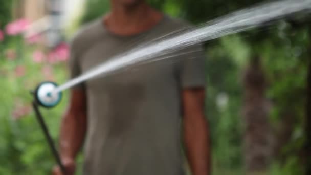 Close Person Watering Garden Man Spraying Water Backyard Water Irrigation — 图库视频影像